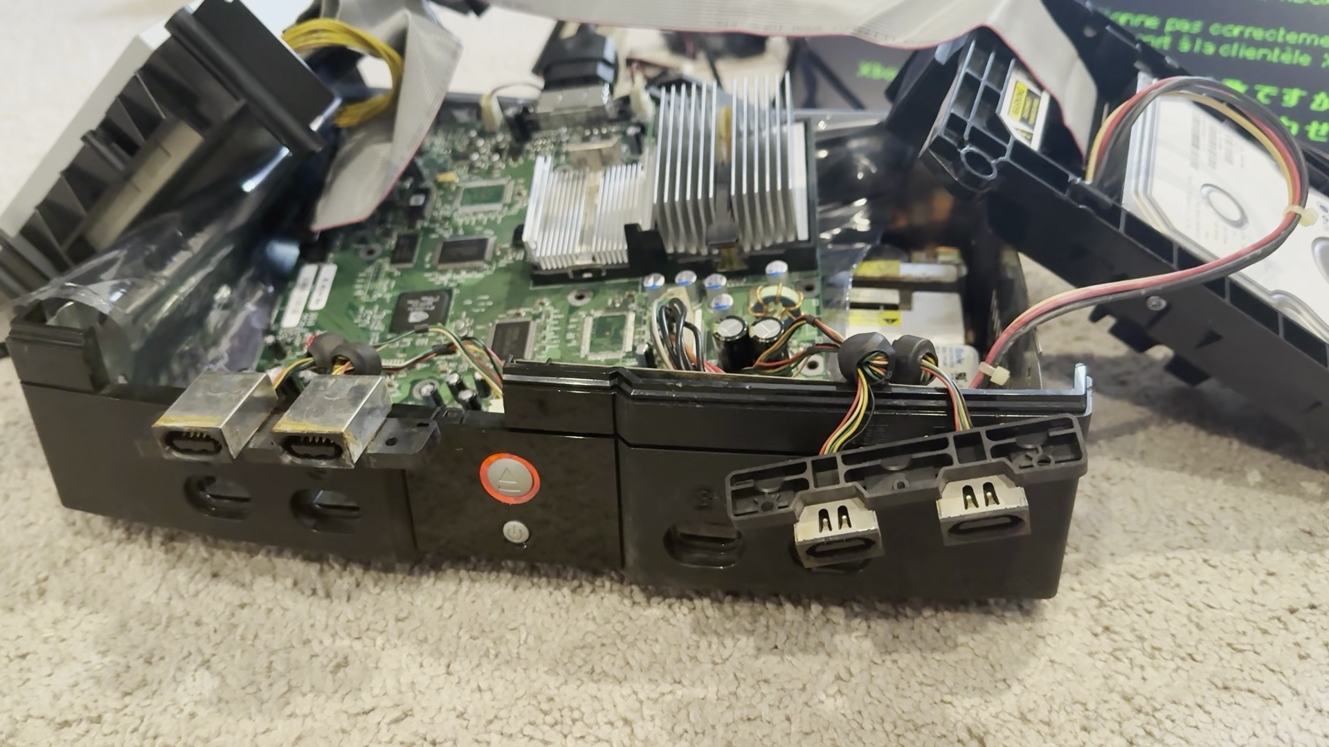 "Christmas Lights& around the power button of the failing Xbox.